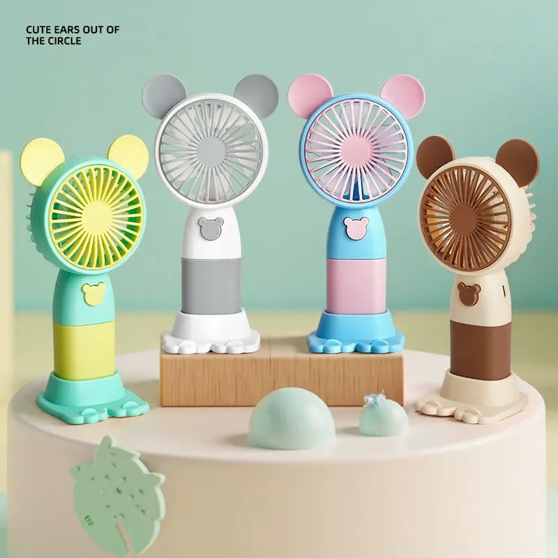 New cross-border mini cartoon handheld USB rechargeable portable mini fan for students, silent wholesale cooling